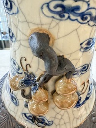A pair of Chinese blue and white Nanking crackle-glazed 'Dragons' vases, 19th C.