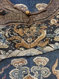 A Chinese silk blue-ground summer gauze 'Dragons' robe, 19th C.