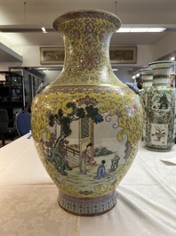 A pair of large Chinese famille rose yellow-ground 'Hu' vases with narrative design, Qianlong mark, Republic