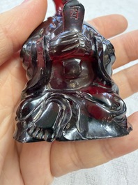 A rare complete set of 12 Chinese cherry amber 'Zodiac' figures on wooden stands, Qianlong mark, Republic