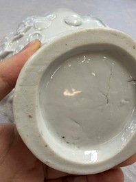 A very large Chinese Dehua blanc de Chine libation cup with a dragon, a qilin, a tiger and a crane, 18th C.