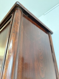 A large Chinese elmwood tapered round-corner cabinet, 'Yuanjiaogui', early Qing, 17/18th C.