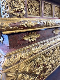 An exceptional Vietnamese gilt-lacquered wood and ivory 'Dragon and Phoenix' throne-shaped altar, 18/19th C.