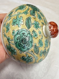 A rare pair of Chinese famille verte yellow-ground 'Flower Scroll' covered vases, Kangxi