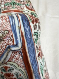 A rare Chinese wucai figure of a dignitary, late Ming/Transitional period