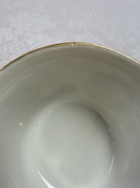 A fine Chinese iron-red gilt-decorated covered teabowl with a stand, Guangxu mark and of the period