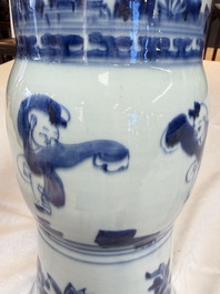 A pair of large Chinese blue and white 'Gu' vases with elegant ladies and playing boys, Kangxi