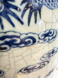A pair of Chinese blue and white Nanking crackle-glazed 'Dragons' vases, 19th C.