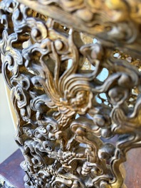 An exceptional Vietnamese gilt-lacquered wood and ivory 'Dragon and Phoenix' throne-shaped altar, 18/19th C.