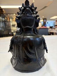 A fine Chinese bronze figure of Bodhisattva holding a ruyi, Ming
