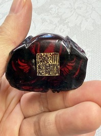 A rare complete set of 12 Chinese cherry amber 'Zodiac' figures on wooden stands, Qianlong mark, Republic