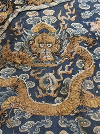 A Chinese silk blue-ground summer gauze 'Dragons' robe, 19th C.