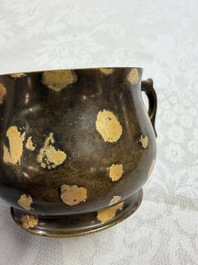 A Chinese gold-splashed bronze censer with two handles, Xuande mark, 18th C.