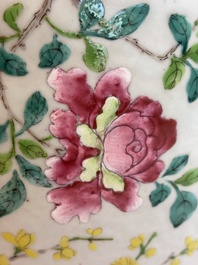 A Chinese famille rose garden seat with butterflies, flowers and fruiting branches, 19th C.