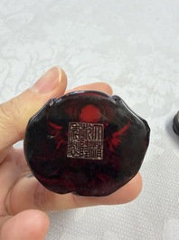 A rare complete set of 12 Chinese cherry amber 'Zodiac' figures on wooden stands, Qianlong mark, Republic