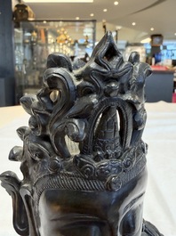 A fine Chinese bronze figure of Bodhisattva holding a ruyi, Ming