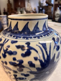Two Chinese blue and white 'Lotus Scroll' vases and covers, Kangxi