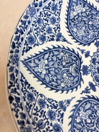 A pair of large Chinese blue and white 'Gu' vases with elegant ladies and playing boys, Kangxi