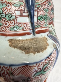 A rare Chinese wucai figure of a dignitary, late Ming/Transitional period