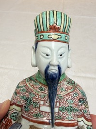 A rare Chinese wucai figure of a dignitary, late Ming/Transitional period