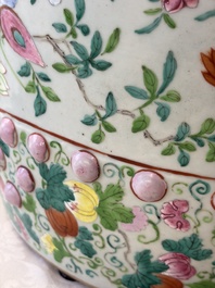 A Chinese famille rose garden seat with butterflies, flowers and fruiting branches, 19th C.