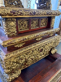 An exceptional Vietnamese gilt-lacquered wood and ivory 'Dragon and Phoenix' throne-shaped altar, 18/19th C.