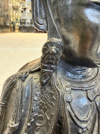 A fine Chinese bronze figure of Bodhisattva holding a ruyi, Ming