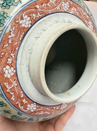 A rare pair of Chinese famille verte yellow-ground 'Flower Scroll' covered vases, Kangxi