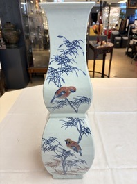 A Chinese blue, white and copper-red 'Birds among Flowering Branches' square gourd vase, 19th C.