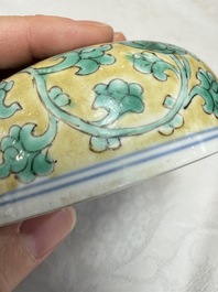 A rare pair of Chinese famille verte yellow-ground 'Flower Scroll' covered vases, Kangxi