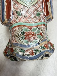 A rare Chinese wucai figure of a dignitary, late Ming/Transitional period
