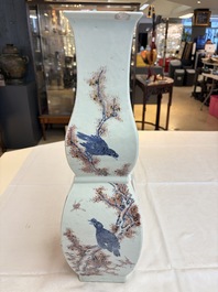 A Chinese blue, white and copper-red 'Birds among Flowering Branches' square gourd vase, 19th C.