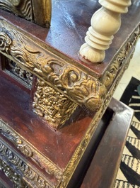 An exceptional Vietnamese gilt-lacquered wood and ivory 'Dragon and Phoenix' throne-shaped altar, 18/19th C.