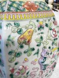 A pair of Chinese famille rose 'Antiquities' vases and covers, 19th C.