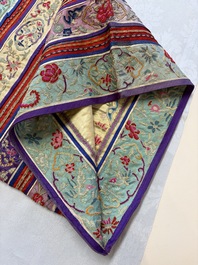A Chinese embroidered silk red-ground women's robe, 19th C.