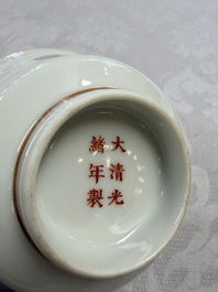 A fine Chinese iron-red gilt-decorated covered teabowl with a stand, Guangxu mark and of the period