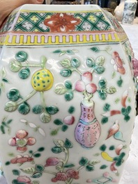 A pair of Chinese famille rose 'Antiquities' vases and covers, 19th C.