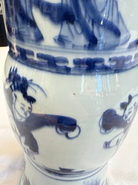 A pair of large Chinese blue and white 'Gu' vases with elegant ladies and playing boys, Kangxi
