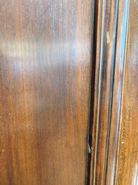 A large Chinese elmwood tapered round-corner cabinet, 'Yuanjiaogui', early Qing, 17/18th C.