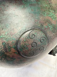 A large Chinese archaistic bronze wine vessel and cover with ram-form handles, Lei 罍, Ming