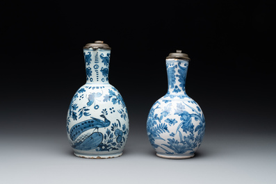 Two blue and white Dutch Delft jugs with pewter lids, 17/18th C.