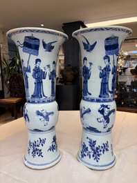 A pair of large Chinese blue and white 'Gu' vases with elegant ladies and playing boys, Kangxi