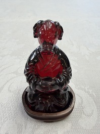 A rare complete set of 12 Chinese cherry amber 'Zodiac' figures on wooden stands, Qianlong mark, Republic