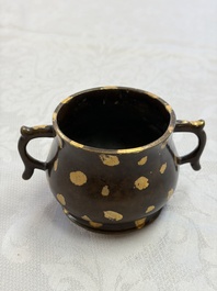 A Chinese gold-splashed bronze censer with two handles, Xuande mark, 18th C.