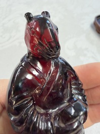 A rare complete set of 12 Chinese cherry amber 'Zodiac' figures on wooden stands, Qianlong mark, Republic