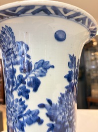 A pair of large Chinese blue and white 'Gu' vases with elegant ladies and playing boys, Kangxi