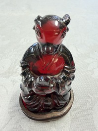 A rare complete set of 12 Chinese cherry amber 'Zodiac' figures on wooden stands, Qianlong mark, Republic