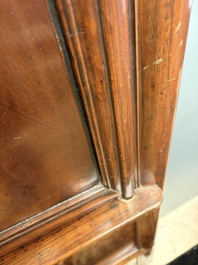 A large Chinese elmwood tapered round-corner cabinet, 'Yuanjiaogui', early Qing, 17/18th C.