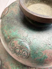 A large Chinese archaistic bronze wine vessel and cover with ram-form handles, Lei 罍, Ming