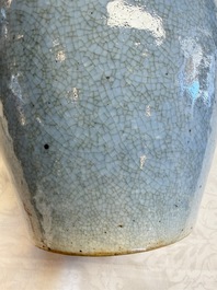 A Chinese celadon crackle-glazed vase and a lavender-blue crackle-glazed vase, 18/19th C.
